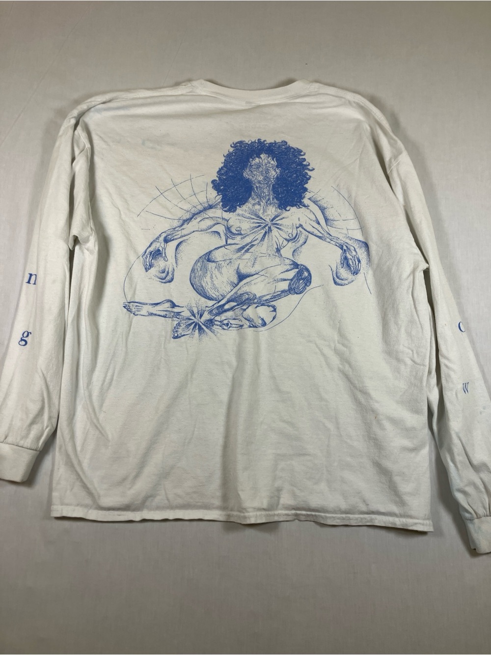 White Long-Sleeve Graphic Tee with Blue Illustration